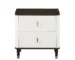 Goldoma Carena white and brown nightstand with USB ports next to a bed