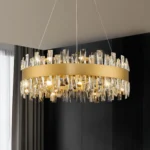 Modern crystal chandelier hanging over a dining table in a contemporary living room