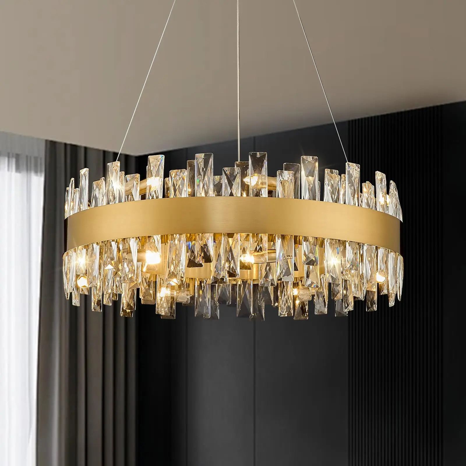 Modern crystal chandelier hanging over a dining table in a contemporary living room
