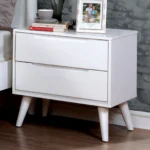 Modern white nightstand with 2 drawers and tapered legs in a bedroom setting