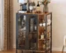 Mid-century modern storage cabinet with doors and mesh panels in a living room