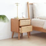 Solid oak bedside cabinet with rattan drawers in modern Nordic style