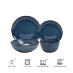 Set of six organic stoneware dinner plates with irregular edges and reactive glaze on a wooden table