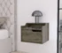 White wall mounted nightstand with drawer and dual shelves in a bedroom