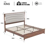Goldoma LED king bed frame with upholstered headboard and charging station in a modern bedroom