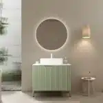 Detail shot of the curved striped edge of the floating vanity, contrasting the white ceramic basin with the woodgrain