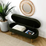 Green oval storage ottoman bench with rubber wood legs and lid open showing interior storage space