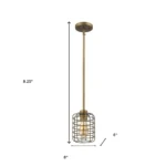 HMS modern brass hanging light illuminating a hotel lobby seating area, with the brushed gold cage and warm white light