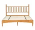 Rustic oak queen bed frame with headboard in a cozy bedroom setting