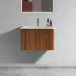 White+walnut wall-mounted bathroom vanity with sink and striped push-open drawers, front view against a tiled wall.