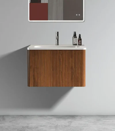 White+walnut wall-mounted bathroom vanity with sink and striped push-open drawers, front view against a tiled wall.