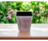 Brown and off-white recycled plastic square planter with tone-on-tone textural design, set on a wooden deck with