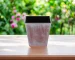 Brown and off-white recycled plastic square planter with tone-on-tone textural design, set on a wooden deck with