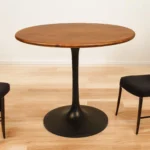 36 inch round pedestal dining table with solid wood top and black iron base - Goldoma