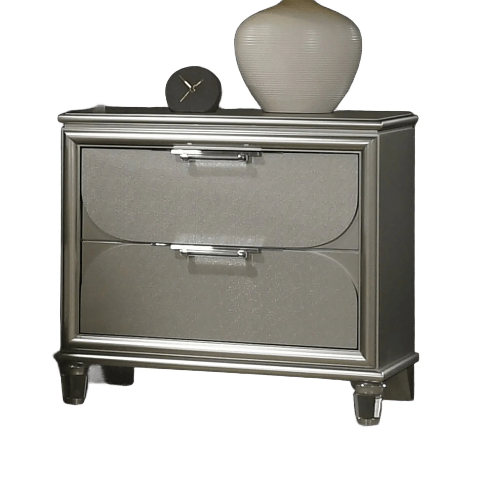 Silver nightstand with acrylic handles and embossed panels in a bedroom setting