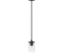 Single pendant light with clear glass shade and matte black iron frame, hanging over a dining table.