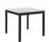 Modern rectangular solid wood dining table with white marble accents in a bright dining room
