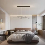 Modern 3-light pendant in a living room setting, casting soft light over a sofa and coffee table.