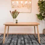 Goldoma mid-century modern rectangular dining table with walnut finish and faux wood marble design top