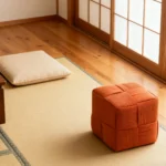 Brown corduroy ottoman foot rest with square shape and MDF frame in a modern living room setting.