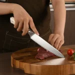 Goldoma 6-piece non stick knife set with Damascus steel blades and ABS handles on cutting board