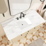 Close-up of the classic elegance vanity's brushed gold hardware and soft-close drawer, showing wood grain texture.