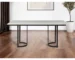 Modern rectangular dining table in white and black finish with solid wood top and tapered legs