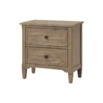 Wire brushed warm gray nightstand with two drawers and round knobs in a bedroom setting