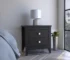 Goldoma Amara black nightstand with drawers in a modern bedroom setting