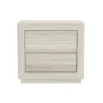Whitewashed oak nightstand with two drawers in modern minimalist style beside a bed in a bedroom