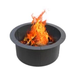 Outdoor fire pit with galvanized steel ring and burning wood