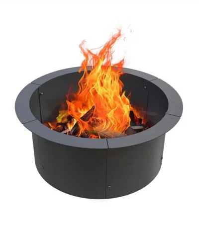 Outdoor fire pit with galvanized steel ring and burning wood