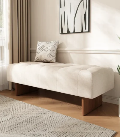 Goldoma modern tufted linen bench with solid wood legs and button tufting in a living room setting