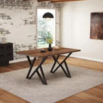 Walnut MDF dining table with black metal legs in an indoor dining room setting