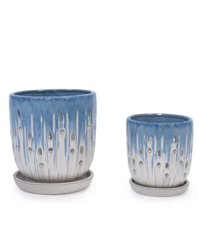 Large ceramic planter set with blue-white gradient finish on a wooden table