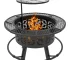 Black outdoor fire pit with glowing flames in a backyard setting