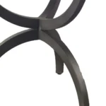 Goldoma 40 inch round marble dining table with black metal three-leg base in a modern dining room setting