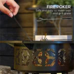 Black outdoor fire pit with glowing flames in a backyard setting
