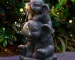 Solar elephant statue glowing at night in garden with warm LED light