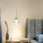 Goldoma 5W Mini LED Jellyfish pendant light with acrylic shade, warm glow over kitchen island