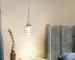 Goldoma 5W Mini LED Jellyfish pendant light with acrylic shade, warm glow over kitchen island