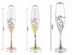 Elegant crystal champagne glasses set on a table with sparkling wine