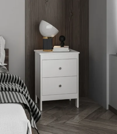 Modern white nightstand with two drawers beside a bed in a contemporary bedroom