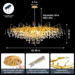 Modern crystal chandelier hanging in a dining room with gold finish and tree branch design