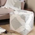 Handwoven cotton pouf ottoman cover in black textured pattern, unstuffed 18 inch cube footstool