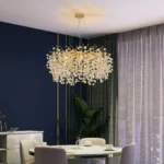 Luxury crystal chandelier illuminating a grand hotel lobby with sparkling K9 crystals