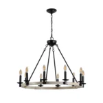 Close-up of the black metal and wood chandelier, showing the candle holders and rustic finish