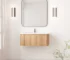 Floating curved bathroom vanity cabinet in white with marble countertop, mounted on wall, front view.