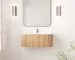 Floating curved bathroom vanity cabinet in white with marble countertop, mounted on wall, front view.