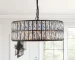 Modern black crystal chandelier hanging over a dining table, 18-inch round adjustable height pendant light with